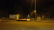 Parkta oturan kadının başına yorgun mermi isabet etti