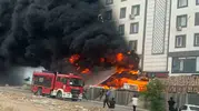 Karaköprüde apartman sakinlerini korkutan depo yangını