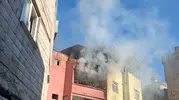 Siirt merkezde üç katlı binada korkutan yangın