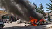 Ceylanpınar Devlet Hastanesi otoparkında park halindeki araç alevlere teslim oldu