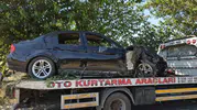 Batman'da kontrolden çıkan otomobil ağaca çarparak boş araziye savruldu
