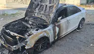 Birecik'te lüks otomobile silahlı saldırı ve kundaklama girişimi