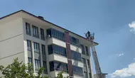 Elazığ merkezindeki yüksek katlı bir binanın bacasında yangın paniği yaşandı