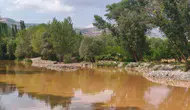 Tunceli’de sağanak yağış sonrası Tağar Çayı kahverengiye büründü