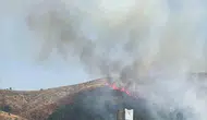 Genç ilçesindeki örtü yangınına ekipler müdahale ediyor