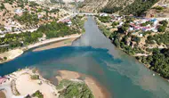 Tunceli'de Munzur ve Pülümür nehirleri yağışla birlikte iki farklı renge büründü