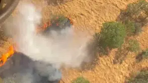 Pervari kırsalındaki örtü yangınına helikopterle müdahale ediliyor