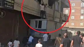 Bismil'de apartman yangını mahsur kalan kadını vatandaşlar kurtardı