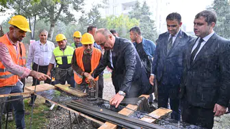 Batman Valisi sağanak yağış altında emekli lokali temelini attı