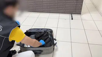 Batman yolunda valiz içine gizlenen uyuşturucu köpeğe yakalandı