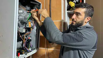 Van'da kombi ustalarının kış mesaisi başladı