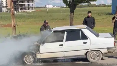 Hilvan yolunda otomobil alev topuna döndü