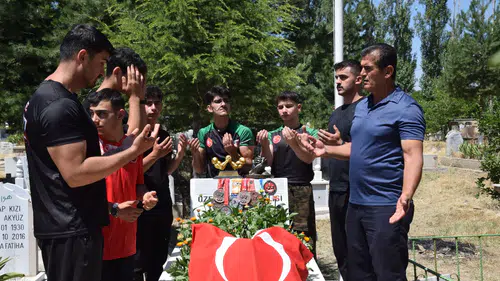 Milli sporculardan şehit Halil Hamuryenin kabrine anlamlı ziyaret