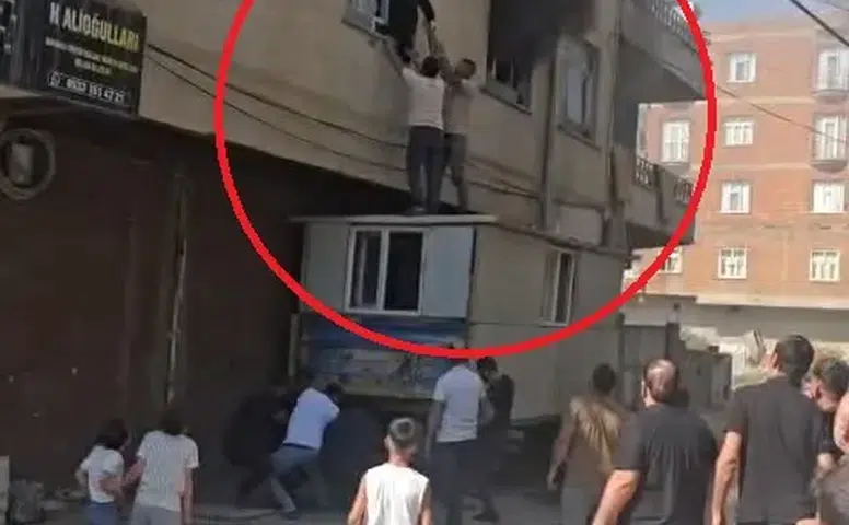 Bismil'de apartman yangını mahsur kalan kadını vatandaşlar kurtardı